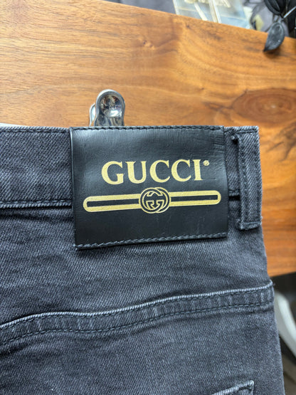 Gucci Faded Black Skinny Jeans with Leather Jacron Patch
