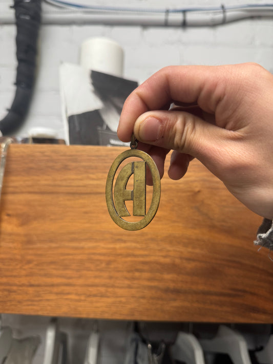 Maison Margiela Brass Line (11) ‘A-Shape’ Oval Pendant