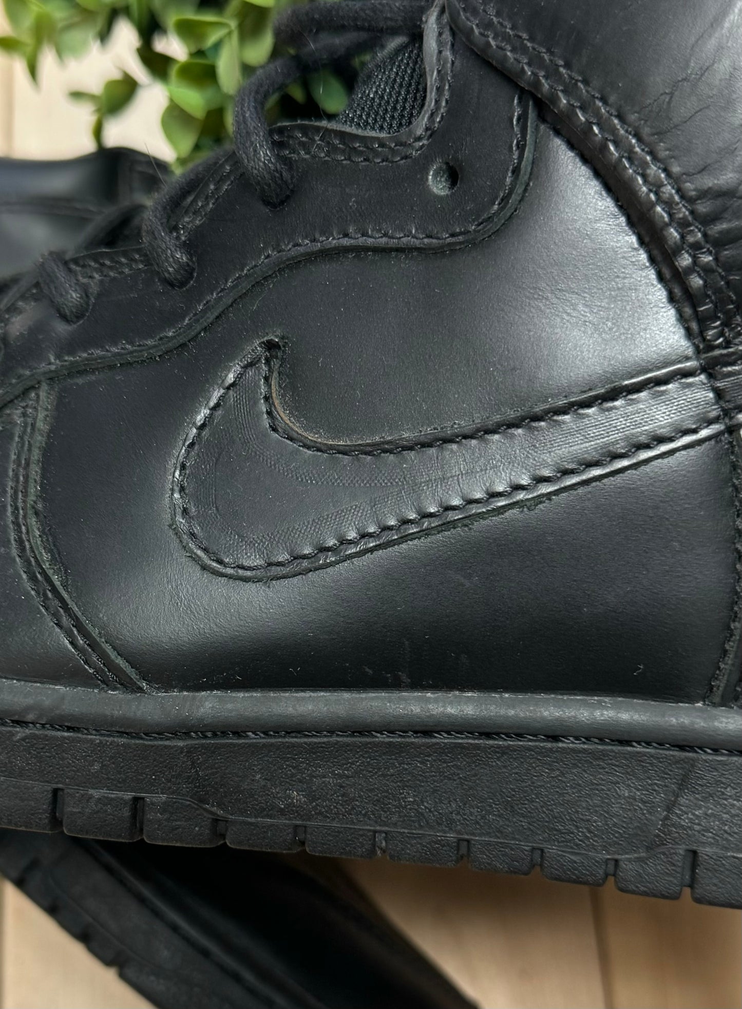 Nike ‘Triple Black’ Leather Dunk High Sneakers