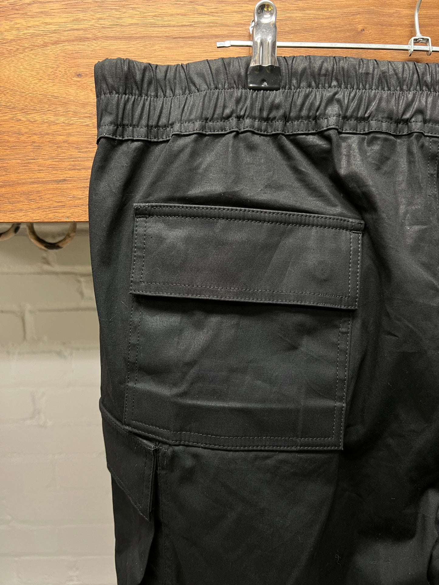 SS2024 Rick Owens ‘Lido’ Waxed Black Cargo Pants