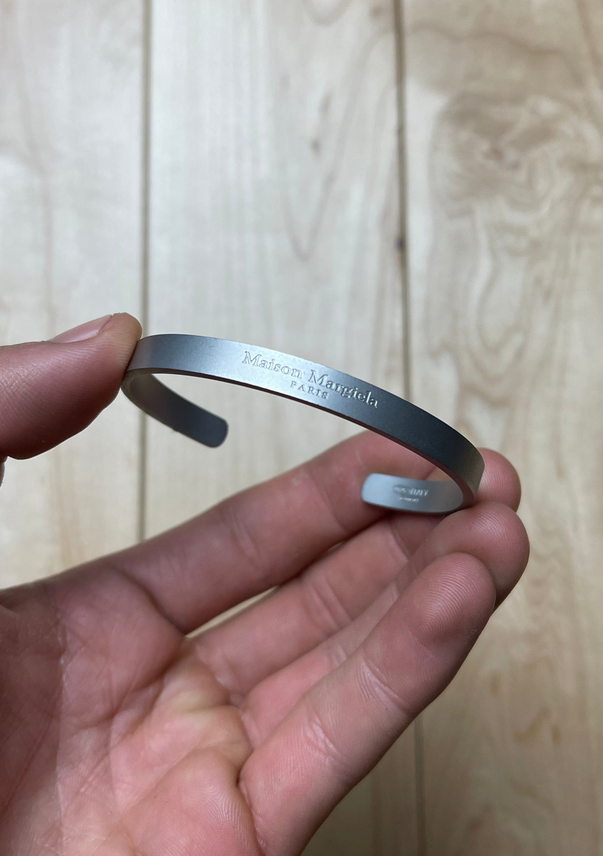 Maison Margiela 925 Silver Engraved Logo Bangle Bracelet – Alex Maison Margiela 925 Silver Engraved Logo Bangle Bracelet – Alex