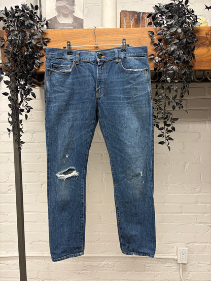 2018 Saint Laurent ‘D02’ Distressed Blue Skinny Jeans
