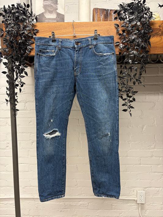 2018 Saint Laurent ‘D02’ Distressed Blue Skinny Jeans