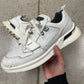 Prada ‘Mechano’ Leather Low Top Sneakers