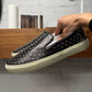 Saint Laurent Studded Leather Slip On Sneakers