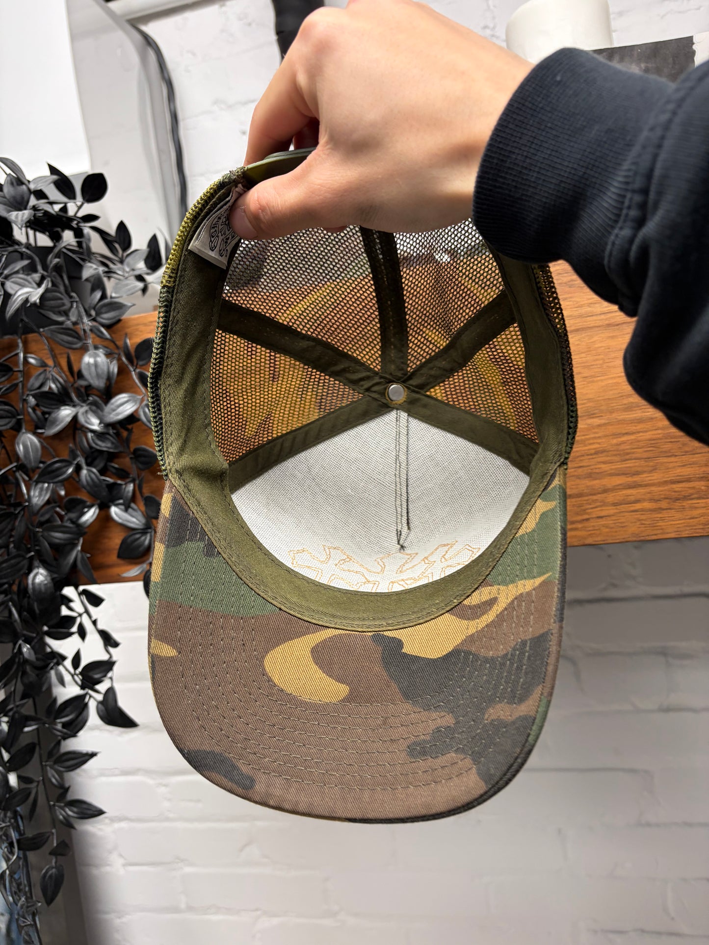 Chrome Hearts Orange ‘Cemetery’ Leather Cross Patch Camo Trucker Hat