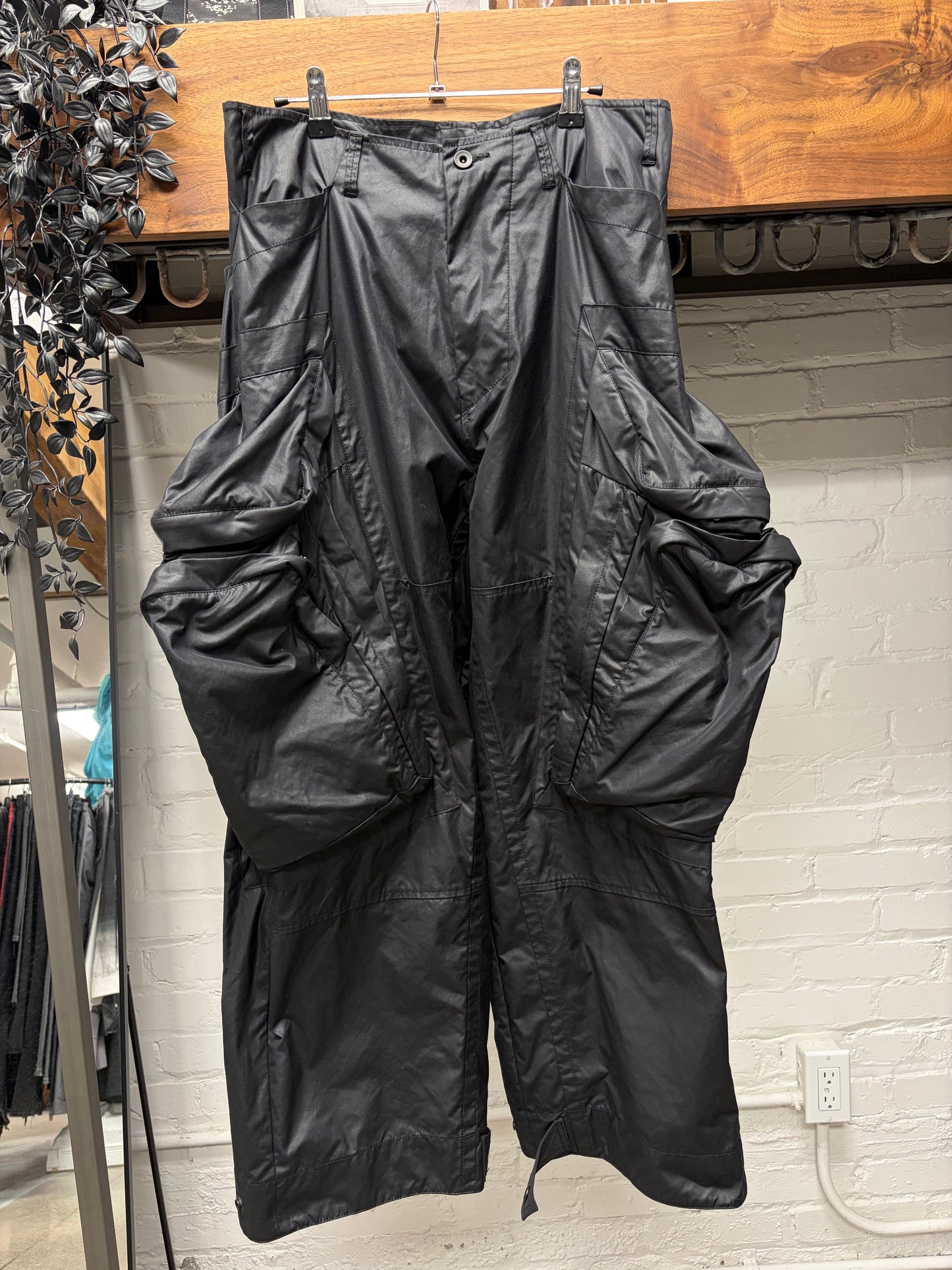 AW2022 Julius ‘Gas Mask’ Waxed Black Wide Leg Cargo Pants