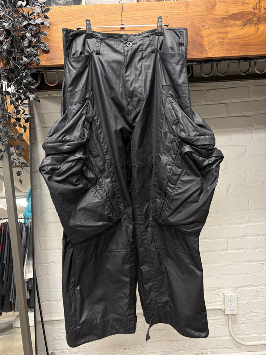 AW2022 Julius ‘Gas Mask’ Waxed Black Wide Leg Cargo Pants