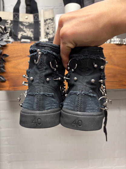 Balenciaga ‘Paris’ Pierced Black Canvas High Top Sneakers
