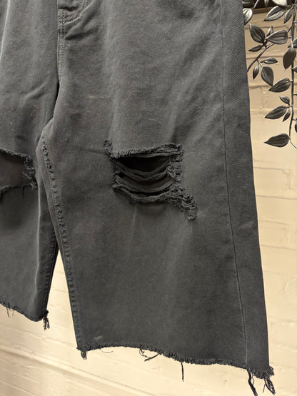 2025 Balenciaga Over Knee Length Distressed Black Raw Hem Denim Shorts