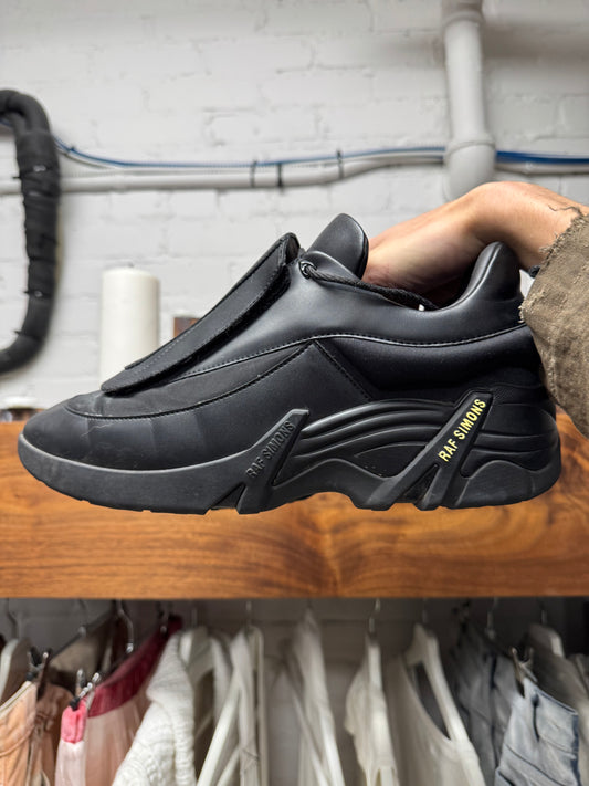 Raf Simons ‘Cyclone’ Triple Black Leather Low Top Sneakers