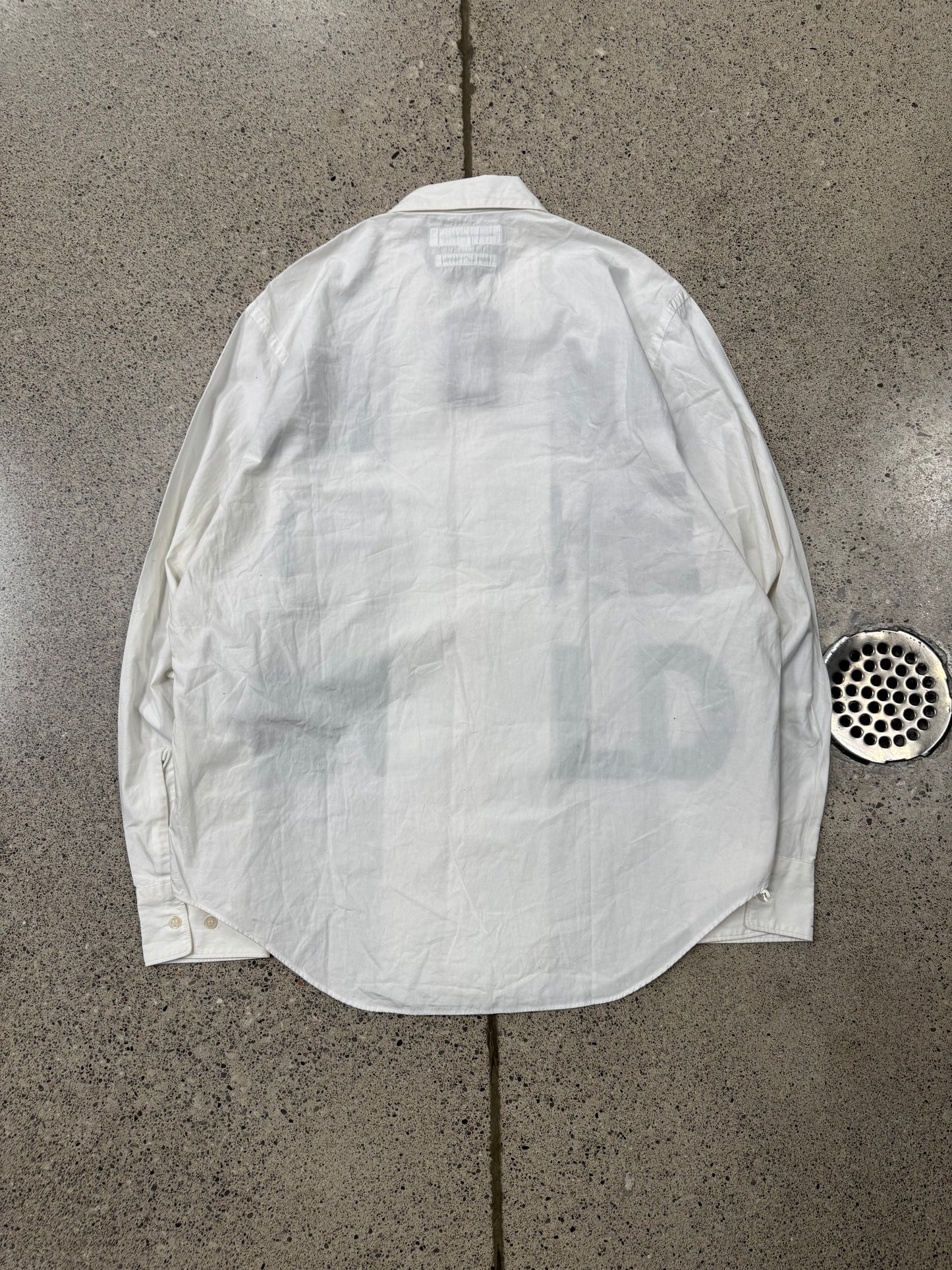 Comme Des Garçons Shirt ‘Free the World’ Painted Button Down Shirt.