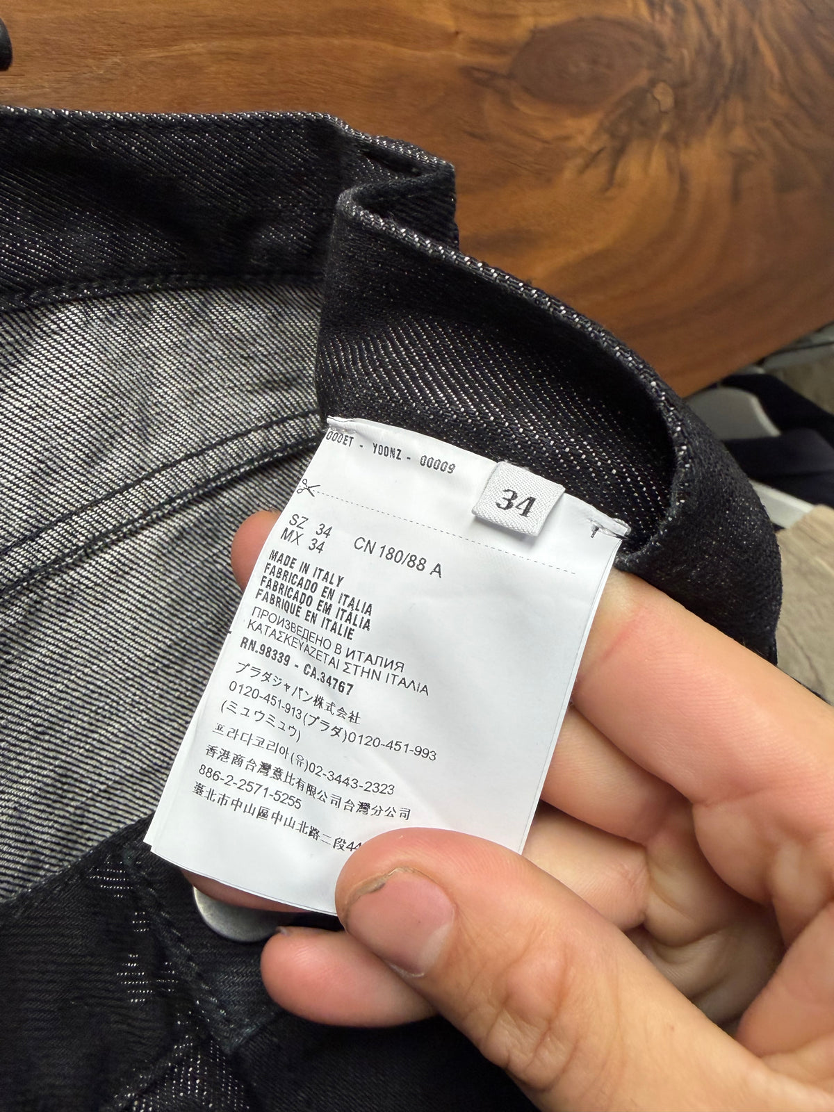 Prada Waxed Black Coated Skinny Jeans with Saffiano Patch Logo