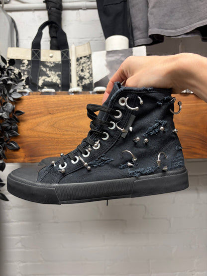 Balenciaga ‘Paris’ Pierced Black Canvas High Top Sneakers