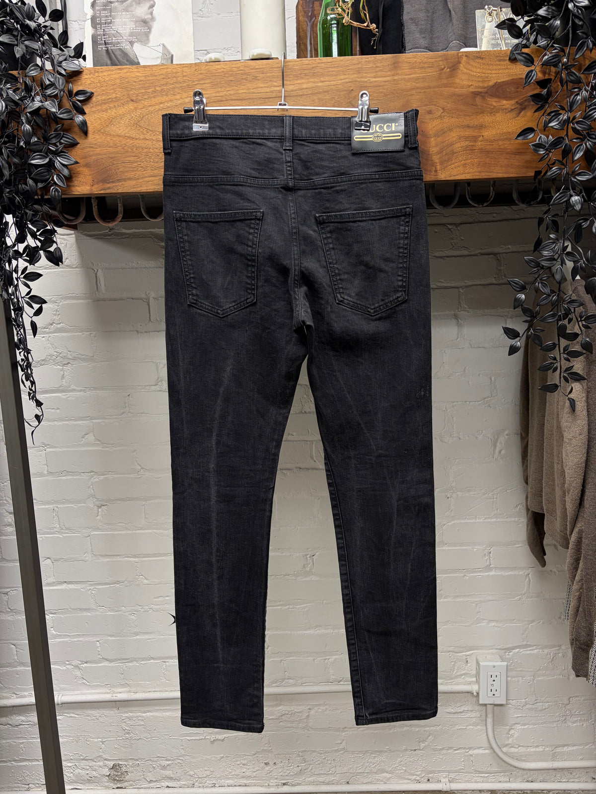 Gucci Faded Black Skinny Jeans with Leather Jacron Patch