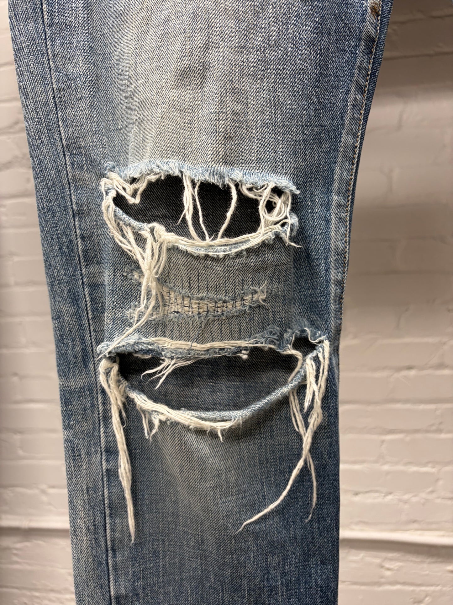 2018 Saint Laurent ‘D02’ Distressed Blue ‘Knee-Rip’ Skinny Jeans