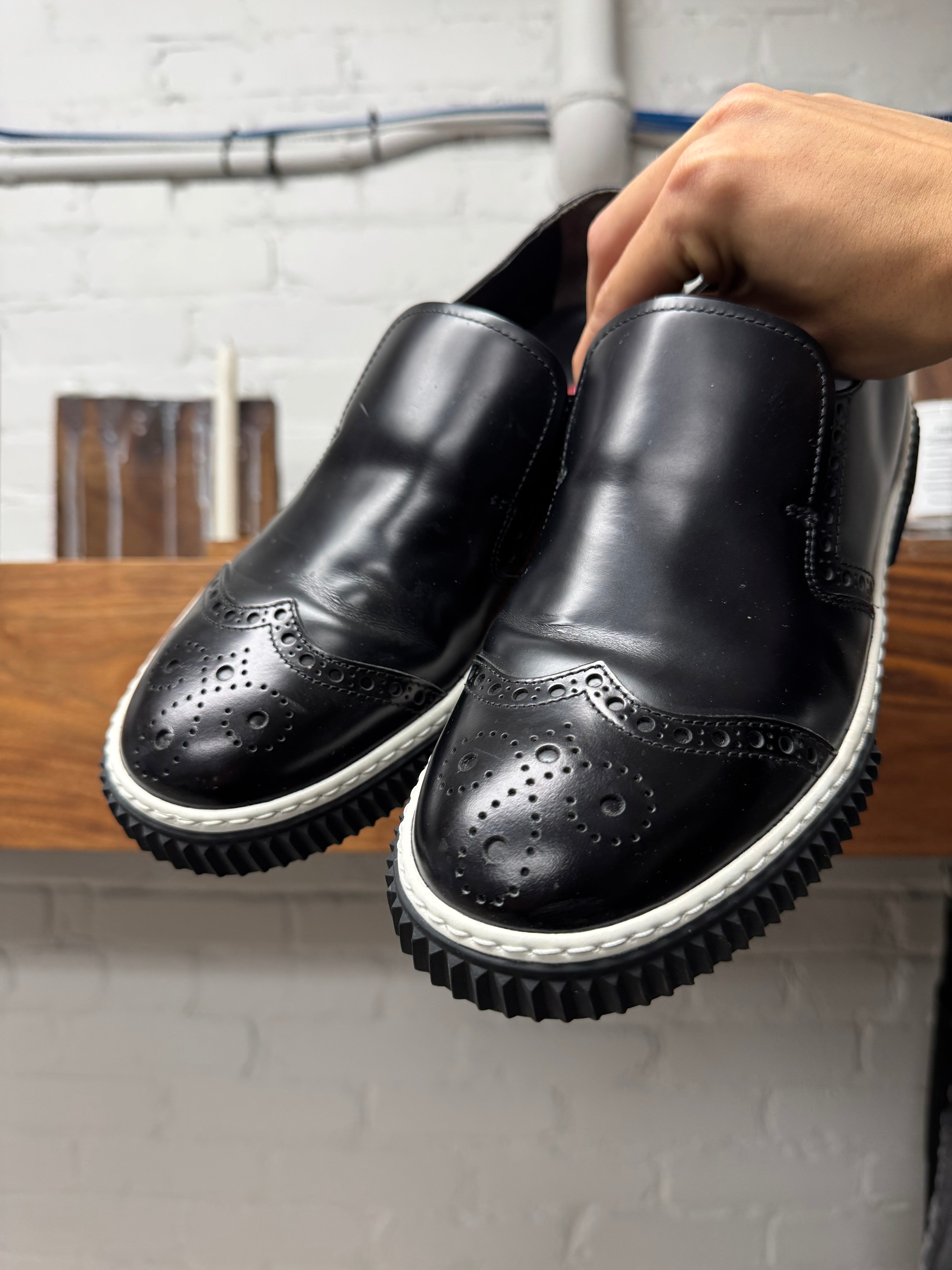 Prada 'Stratus' Slip On Brogue Leather Sneakers – Alex Maxamenko