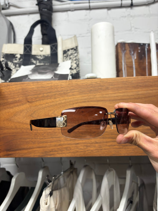 Gucci ‘Guccisima’ Purple Tinted Rimless Sunglasses