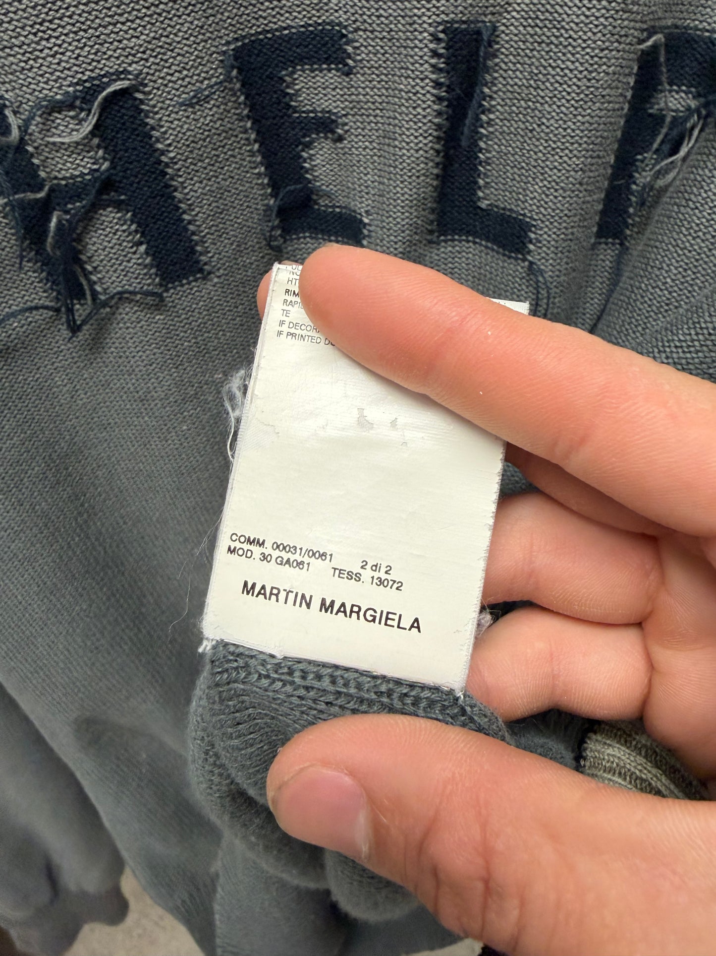 SS2006 Maison Martin Margiela ‘Help’ Distressed Grey Knitted Sweater