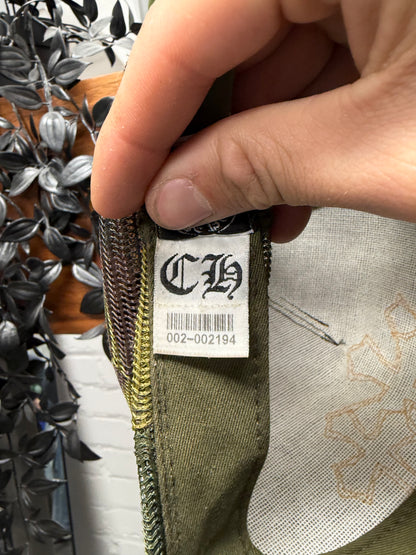 Chrome Hearts Orange ‘Cemetery’ Leather Cross Patch Camo Trucker Hat