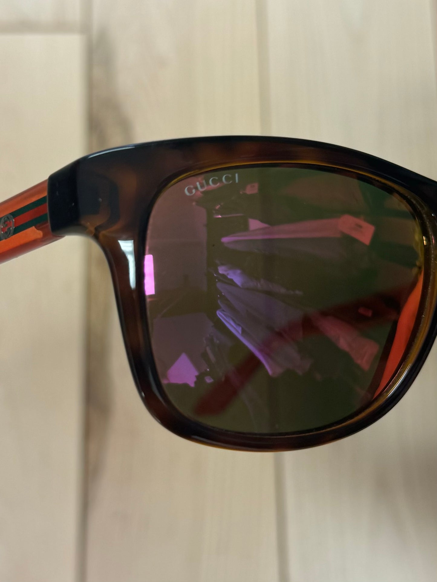 Gucci Red Tint Translucent Frame Sunglasses