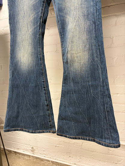 Acne Studios ‘1977’ Washed Blue Flared Leg Denim