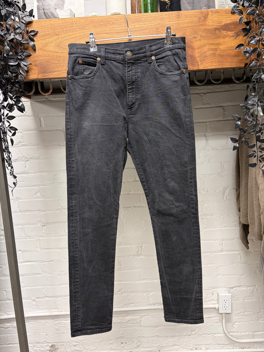 Gucci Faded Black Skinny Jeans with Leather Jacron Patch
