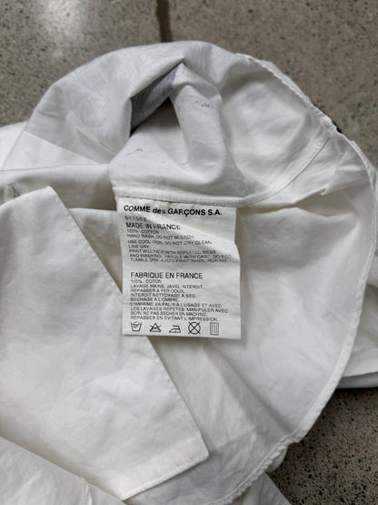 Comme Des Garçons Shirt ‘Free the World’ Painted Button Down Shirt.