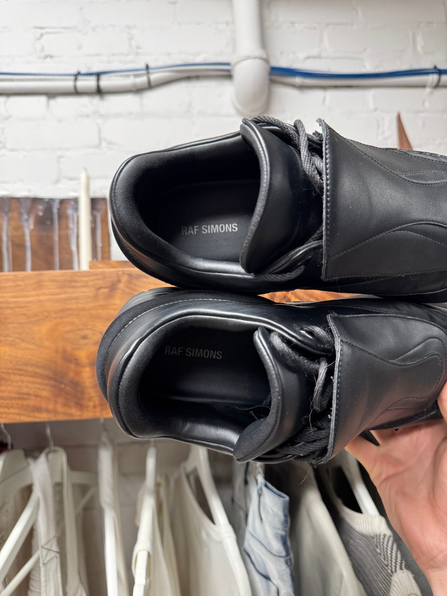 Raf Simons ‘Cyclone’ Triple Black Leather Low Top Sneakers
