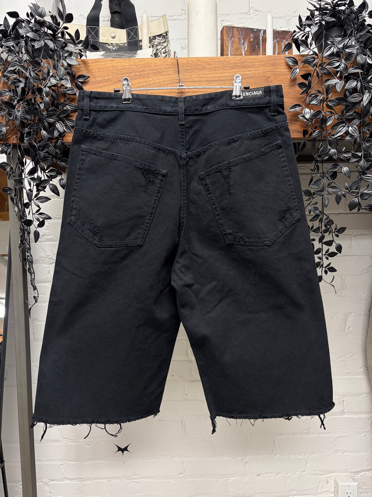 2025 Balenciaga Over Knee Length Distressed Black Raw Hem Denim Shorts