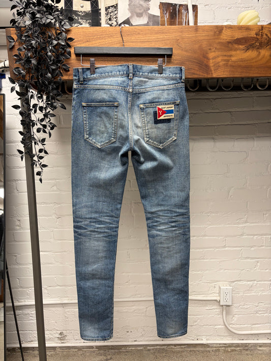 2017 Saint Laurent ‘YSL University’ Patch Blue Skinny Jeans