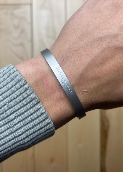 Maison Margiela 925 Silver Engraved Logo Bangle Bracelet – Alex Maison Margiela 925 Silver Engraved Logo Bangle Bracelet – Alex